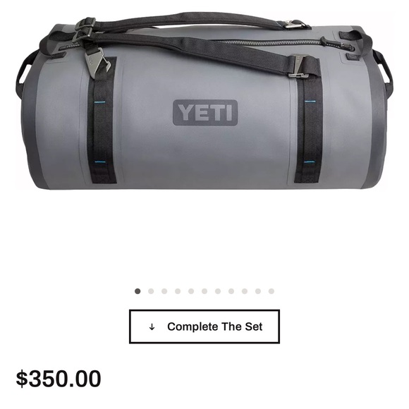 Yeti Gray Duffel Bag with Black Straps and Blue Stitching